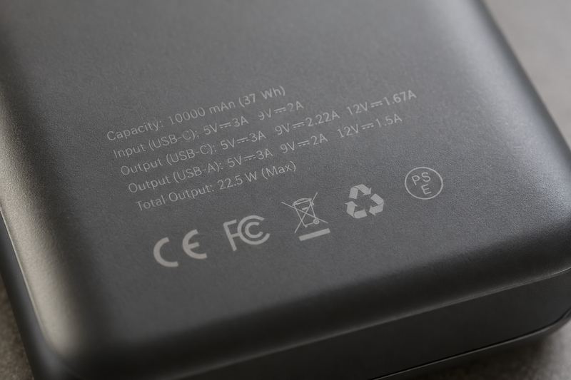 Close-up of the capacity and watt-hour label printed on the back of a power bank.